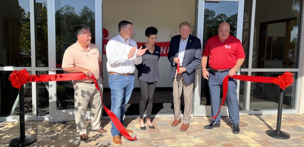 Howard Wheeler, II, President of Chris-Tel Construction, Commissioner and Chairman Brian Hamman, Tommy Doyle, Supervisor of Elections, Donna Doyle, and Commissioner Cecil Pendergrass were just a few in attendance at the event to celebrate